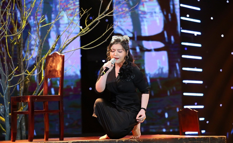 Xuân Nghi tiết lộ Quang Dũng là ca sĩ nổi tiếng đầu tiên mà cô được hát song ca