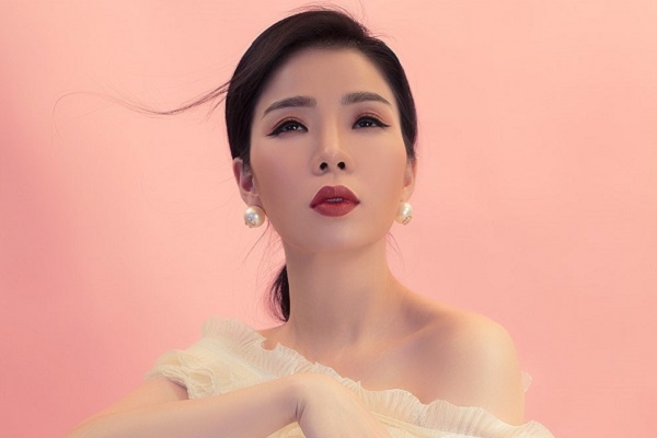Lệ Quyên nói về tình yêu: ‘Càng nắm giữ lại càng thả trôi’